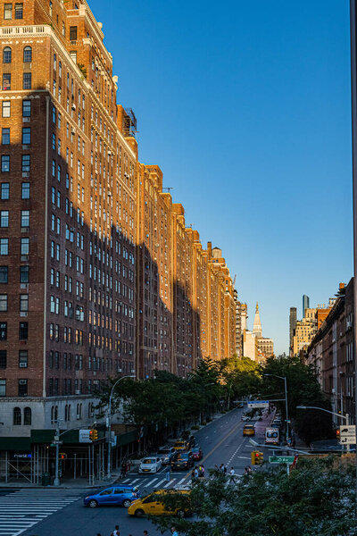 Manhattan, New York, USA - August 29, 2019: High Line Park in Manhattan. View of the surrounding houses and parks. High Line is a popular linear park built on elevated railway tracks.