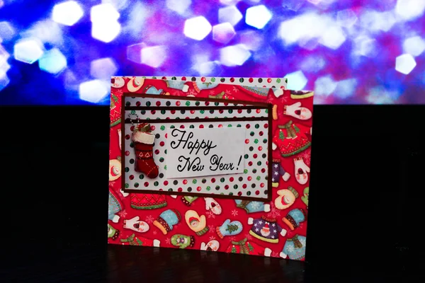 The photo shows a Christmas greeting card — Stock Photo, Image