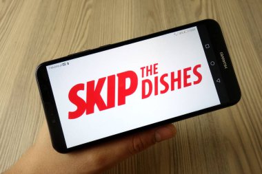 Konskie, Polonya - 11 Kasım 2019: Cep telefonundaki Restoran Hizmetleri Logosu
