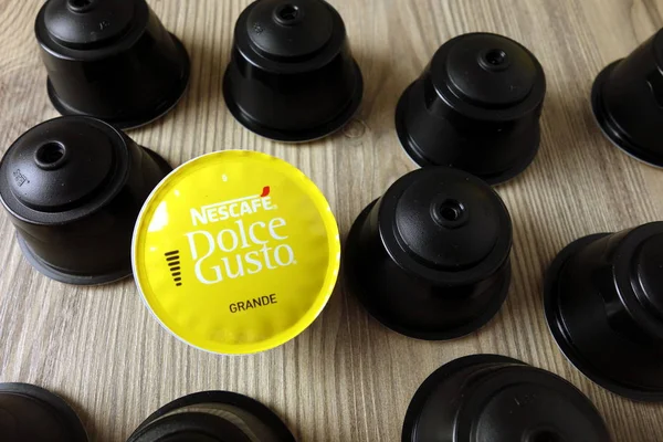 KONSKIE, POLAND - November 11, 2019: Nescafe Dolce Gusto coffee capsules on table — Stock Photo, Image