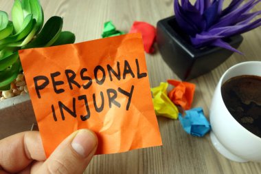 Text personal injury handwritten on sticky note clipart