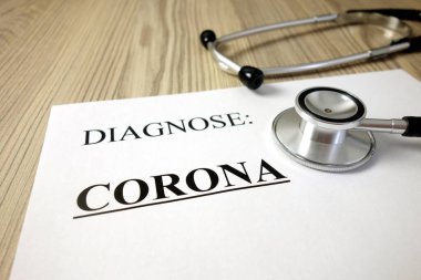 Metin teşhisi: corona (Almanca: coronavirus) steteskop, sağlık konsepti ile tıbbi belge üzerinde