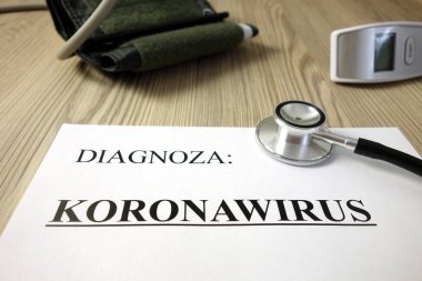Metin diyagnozası: koronawirüs (Lehçe: koronavirüs) aksesuar ve sağlık konseptiyle ilgili tıbbi belge üzerinde