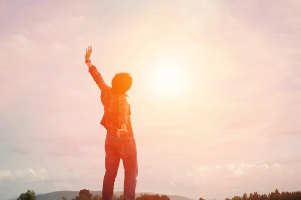 Silhouette Young Man raise hands up for his success Concept of S — Stock Photo, Image