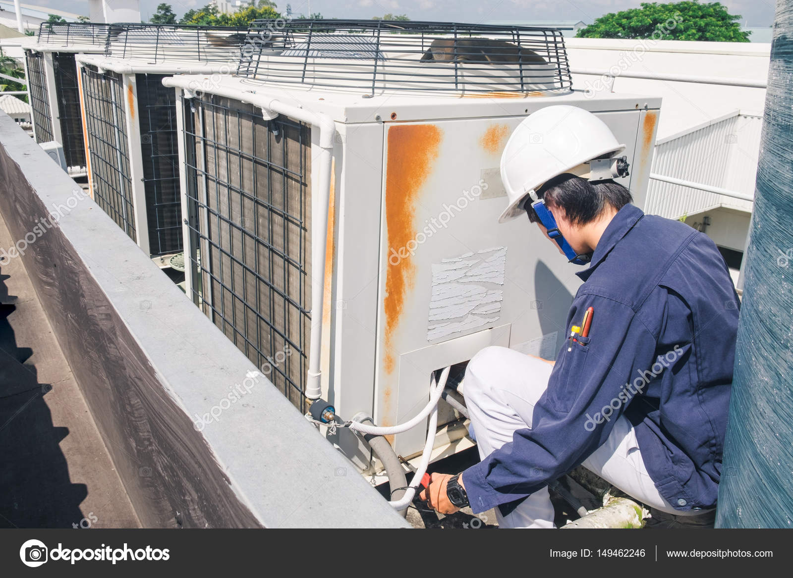 Technician is checking air conditioner — Stock Photo © Joykid 149462246