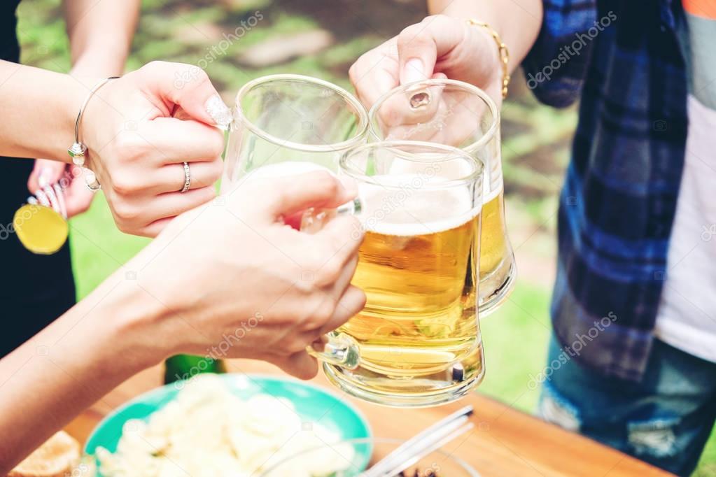 Group of young asian people celebrating beer festivals happy whi