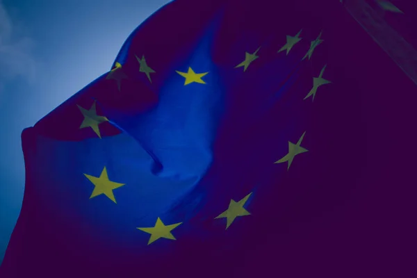 European union flag, blue sky on the background. Blue European u