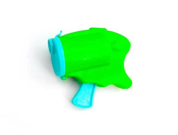 カラフルな緑と青のポッパーパーティーConfetti弾丸銃 白に隔離された ストック画像