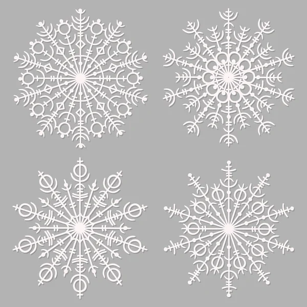 Ensemble de flocons de neige blancs — Image vectorielle