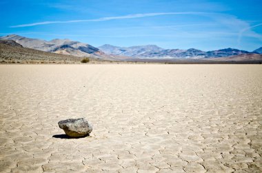 Moving rocks at Racetrack Playa in Death Valley clipart