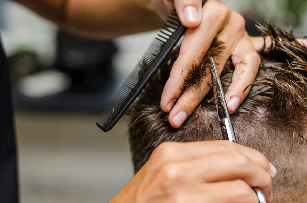 Men's hair cutting scissors in a beauty salon — Stock Photo, Image