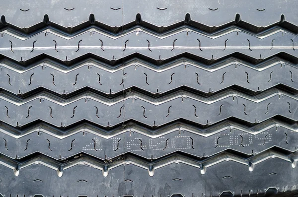 Textured pattern of a new truck tire background — Stock Photo, Image