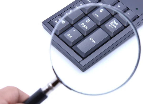 Beyaz arka plan ile hesap makinesi klavyenin Enter tuşuna için Büyüteç