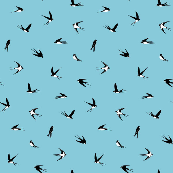 Seamless pattern of black and white swallows on a light cyan background. Flying birds in different views. Vector Design element.