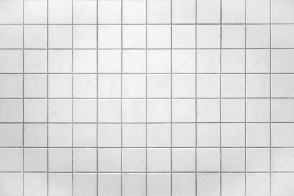 Wall with small white tiles