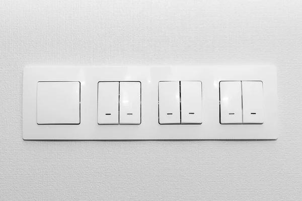 Quatro tomadas elétricas com indicadores led . — Fotografia de Stock