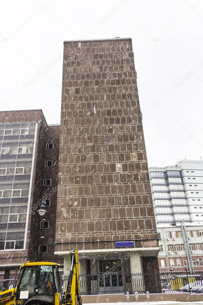 Office building in the center of Moscow, designed by the architect Le Corbusier. The right side of the facade during a snowfall.