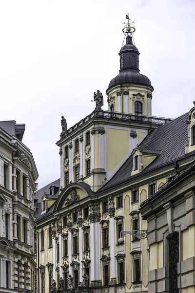 Renovated old university building. Mathematical tower. Gothic and baroque elements of the building. Old Town in Wroclaw, Poland.