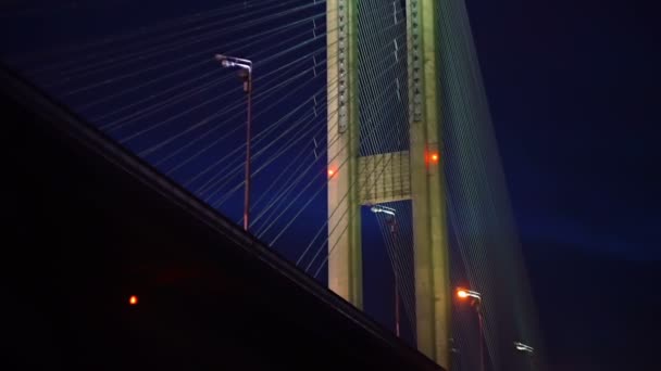 Magnificent view of the glowing night bridge, a bottom point — Stock Video