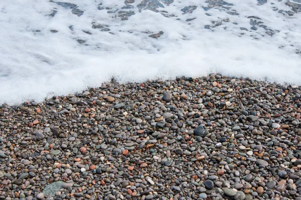Guijarros de colores en la playa —  Fotos de Stock