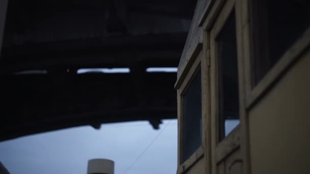 Sailing on the ship under a bridge at dusk — Stock Video