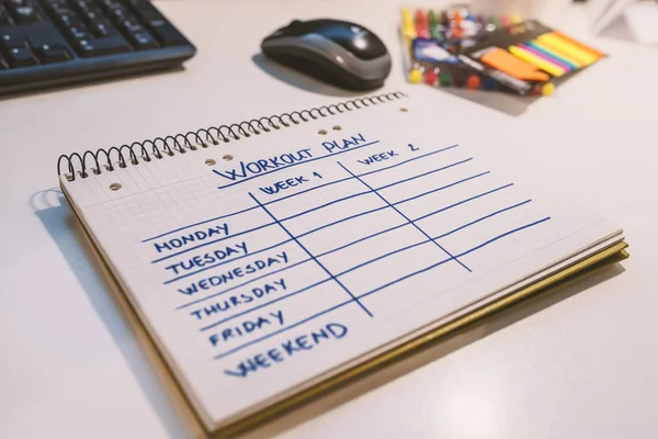Primer Plano Del Plan Entrenamiento Cuaderno Cuadros Concepto Planificación Gestión —  Fotos de Stock