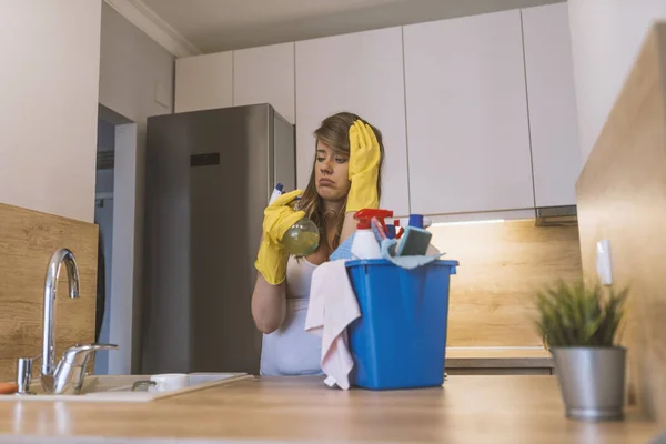 Frustrated Woman Rubber Gloves Apron Holding Basket Cleaning Supplies Front — Stock Photo, Image