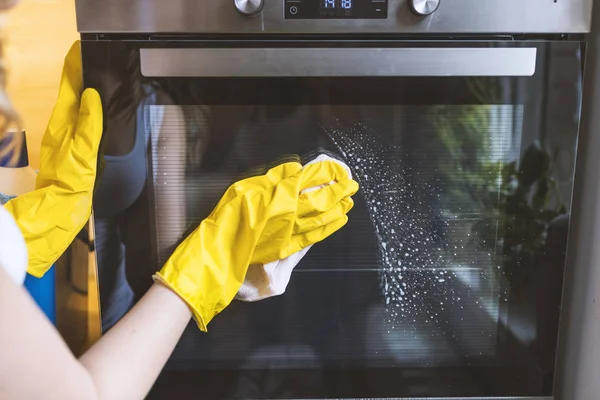 Close Female Hand Yellow Protective Gloves Cleaning Oven Door Young — Stock Photo, Image