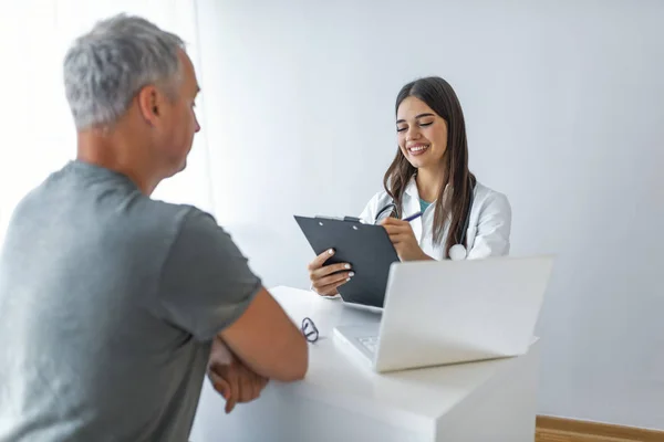 Doctor Patient Medical Office Charming Female Doctor Giving Advice Male — Stock Photo, Image