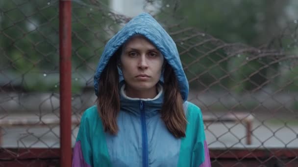 Portrait, Blue-Eyed Girl in the Rain — Stock Video