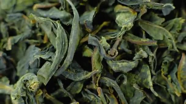 Roterande högen av jasmine grönt te, makro video. — Stockvideo