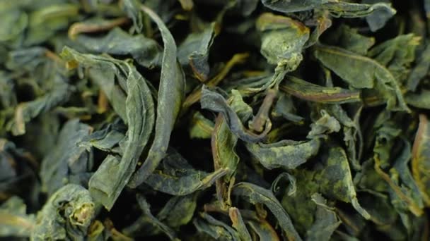 Roterande högen av jasmine grönt te, makro video. — Stockvideo