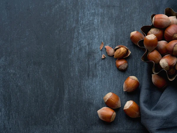 Hazelnuts on a dark background