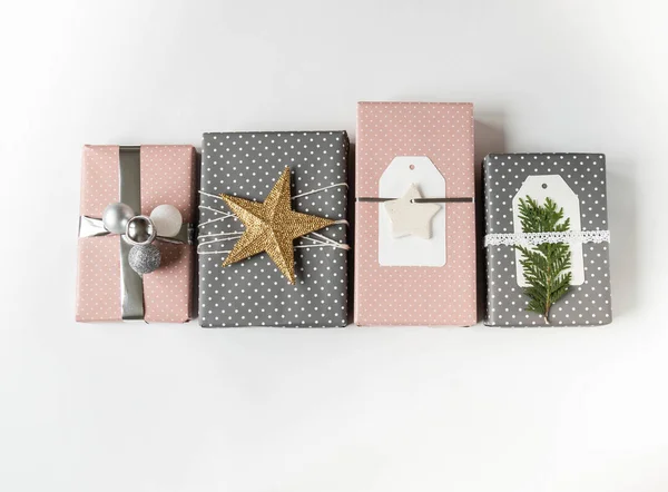 Various Christmas gift boxes. Collection of Christmas gift boxes and decoration on white background. Gift Wrapping Decor Ideas. Flat lay. Copy space