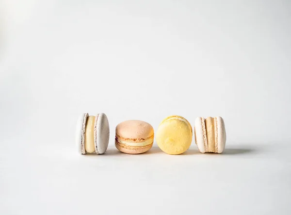 Different fresh french pastel colorful macarons on white background. Copy space — Stock Photo, Image