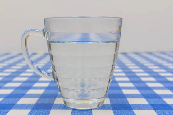 Tea glass filled with hot water on white background — Stock Photo, Image