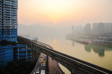 Sunset in Chongqing with traffic clipart