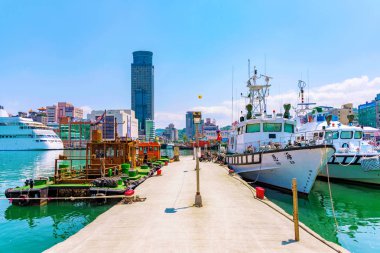 Keelung harbor pier with boats clipart