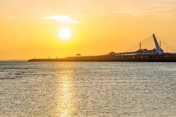 Vista do cais do pescador durante o pôr do sol — Fotografia de Stock