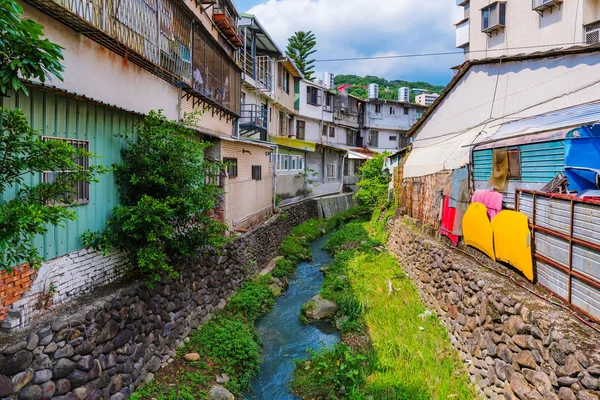 Old traditional houses with a stream — Stock Photo, Image