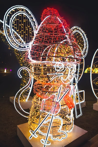 Holiday New Year decorations of the capital of Russia. A Christmas glowing sculpture in the shape Mouse. Installation art `Journey to Christmas`