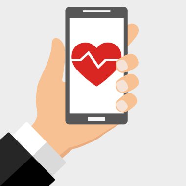 El gri bir arka plan üzerinde bir kalp ile telefon