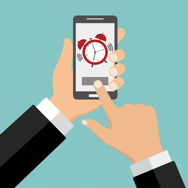 bir çalar saat ile el telefon