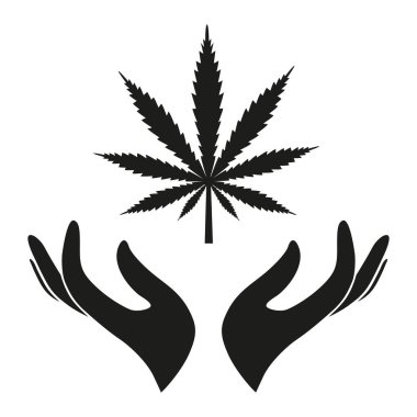 Beyaz bir arka plan üzerinde elinde kenevir yaprak