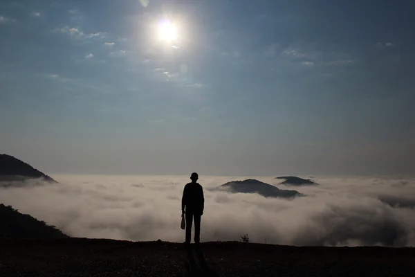 The man above sea of clouds