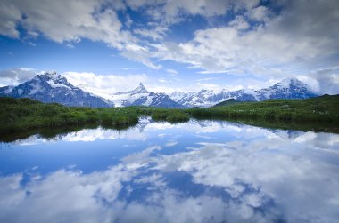      reflection in the lake. Mountains clipart
