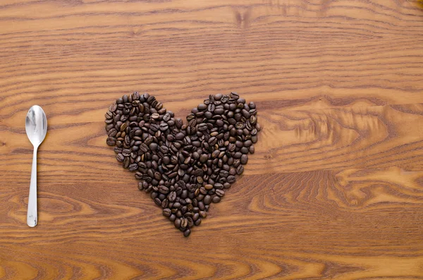 Granos de café y taza — Foto de Stock