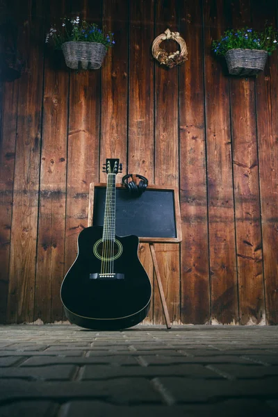 Guitarra Acústica Sobre Una Textura Madera Con Espacio Para Una — Foto de Stock