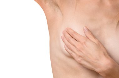 İnce genç kadın göğsünü kontrol