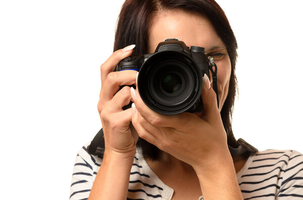 Close up of woman pointing a camera